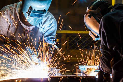 Heavy structural welding with multi-operator power grid